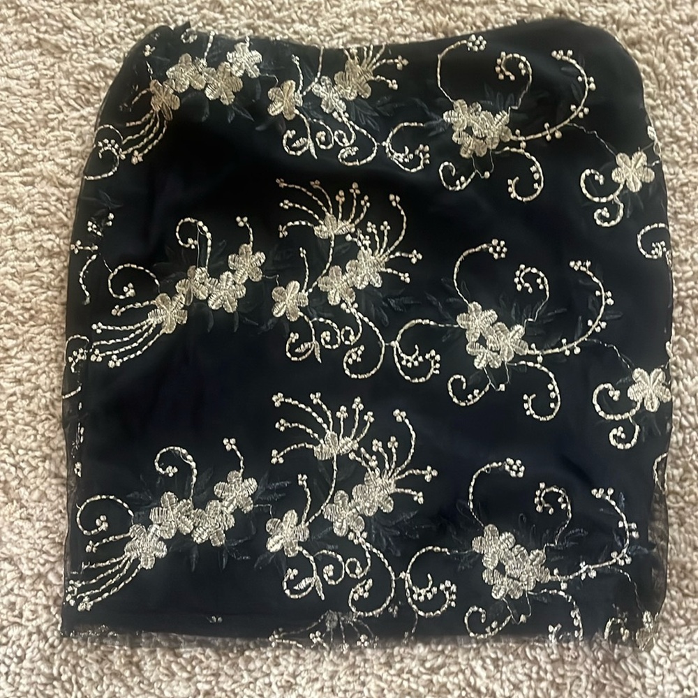 MEDIUM A’GACI black skirt with gold detailing